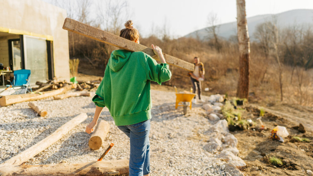 A woman helping with work for a landscaping company in Santa Cruz.